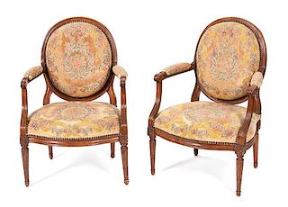 A Pair of Louis XVI Style Fauteuils Height 37 x width 25 x depth 19 inches.