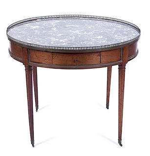 A Louis XVI Style Gueridon Bouillotte Table Height 29 1/2 x diameter 36 inches.