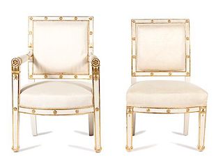 A Set of Four Empire Style Painted and Giltwood Chairs Height 40 inches.