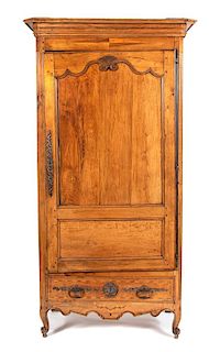 A French Provincial Carved Fruitwood Armoire