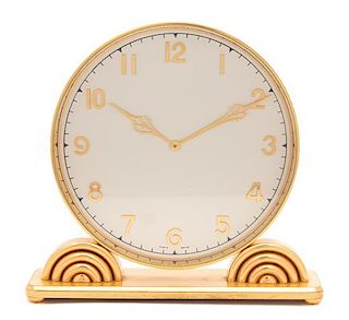 An Art Deco Boxed Brass Boudoir Timepiece Height 6 1/2 x width 7 inches.