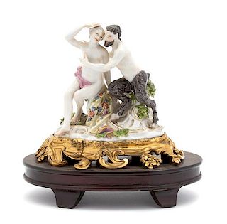 A Meissen Porcelain Group of Satyr and Bacchante Height 5 1/2 inches.