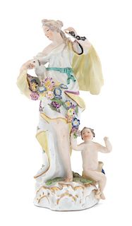 A Meissen Porcelain Figure of Woman with Monkey and Putto Height 6 1/8 inches.