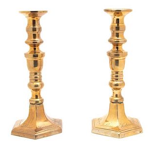 A Pair of Irish Brass Candlesticks