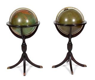 A Pair of Terrestial and Celestial Globes in Mahogany Tripod Stands Height 33 inches.