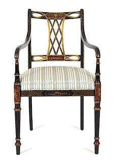 A Regency Style Ebonized and Gilt Decorated Open Armchair Height 37 inches.