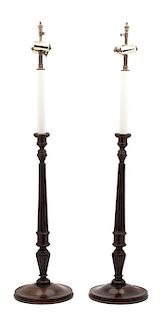 A Pair of English Mahogany Columnar-Form Candlesticks Height overall 34 inches.