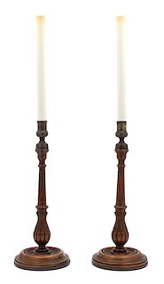 A Pair of English Walnut Columnar-Form Candlesticks Height overall 29 inches.