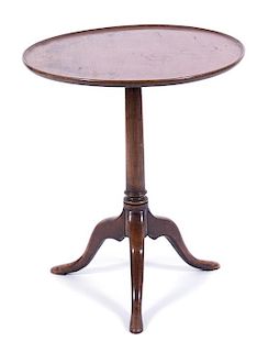 A Chippendale Style Mahogany Pie Crust Tripod Table Height 27 1/2 x diameter 23 1/2 inches.
