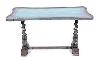 A Mizner Style Painted Table Height 28 x width 52 x depth 27 inches.