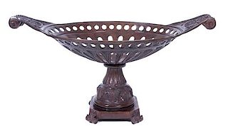 A Patinated Cast Metal Centerpiece Basket Height 15 1/2 x width 30 x depth 16 1/4 inches.