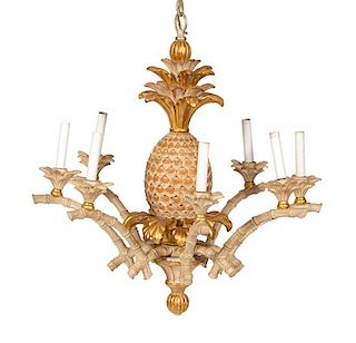 A Carved Painted and Parcel Gilt Eight Light Chandelier Height 28 x diameter 28 inches.
