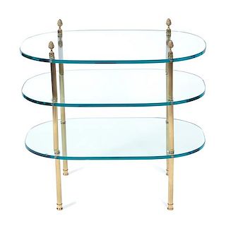 A Pair of Brass and Glass Triple Shelf Side Tables Height 26 inches.