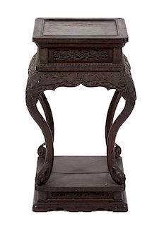 An Asian Carved Hardwood Pedestal Table Height 21 x 12 1/2 inches square.