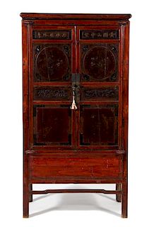 An Asian Hardwood Two-Door Cabinet Height 70 1/4 x width 36 x depth 22 1/4 inches.