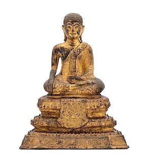 A Gilt Bronze Seated Buddha Height 10 1/2 inches.