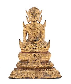 An Ornate Gilt Bronze Seated Buddha Height 6 1/2 inches.
