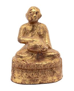 A Thai Gilt Lacquered Wood Figure of Buddha Height 5 1/4 inches.