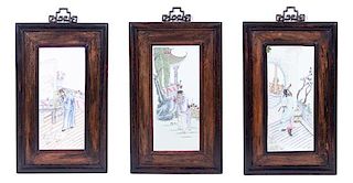 A Set of Three Chinese Enameled Porcelain Plaques Plaque size: 15 x 6 5/8 inches.