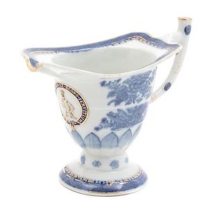 A Chinese Export Blue and White Porcelain Helmet Creamer Height 5 inches.