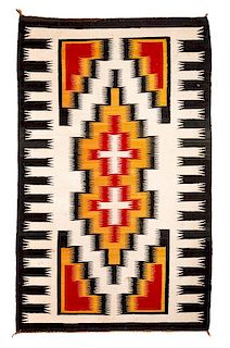 Group of Three Navajo Rugs Largest: 58 x 38 inches