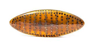 A Silver Inlaid Tortoise Shell Knotting Shuttle, Width 4 inches.