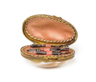 A Victorian Mother-of-Pearl Miniature Sewing Set, Width 2 1/8 inches.