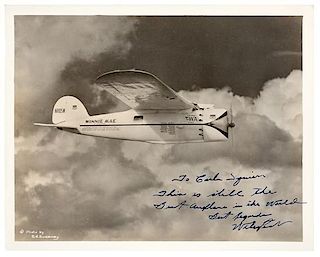 [AVIATION] -- POST, Wiley (1898-1935). Photograph signed and inscribed ("To Carl Squier-, This is still the Best Airplane in the