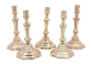 Five Continental Brass Candlesticks