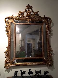 Regence Style Giltwood and Gesso Mirror Height 49 1/2 x width 40 1/2 inches.