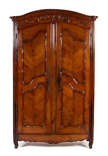 A Louis XV Style Inlaid and Carved Walnut Armoire