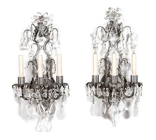 A Set of Four Louis XV Style Silvered Metal, Rock Crystal and Glass Three-Light Sconces