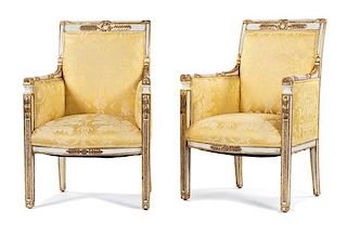 A Pair of Directore Style Parcel-Gilt and Cream-Painted Armchairs