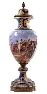 A Napoleonic Sevres Style Gilt Bronze Mounted Porcelain Lidded Urn Height 46 inches.