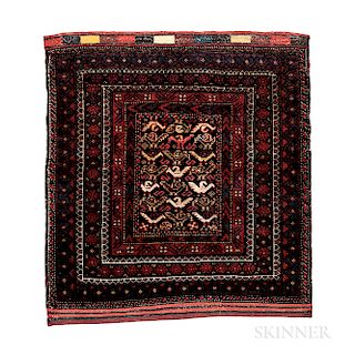 Baluch Bagface, eastern Iran, c. 1900, numerous silk highlights, 2 ft. 7 in. x 2 ft. 5 in.  Provenance:  The Cadle Collect...