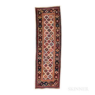 Moghan Long Rug, Caucasus, c. 1860, 12 ft. x 3 ft. 8 in.   Provenance:  The Cadle Collection.