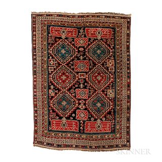 Shirvan Rug, Caucasus, c. 1900, 5 ft. 11 in. x 4 ft. 5 in.  Provenance:  The Cadle Collection.