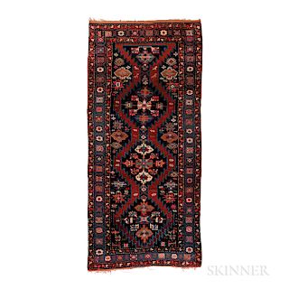 Karabagh Long Rug, Caucasus, c. 1900, 9 ft. 8 in. x 4 ft. 5 in.  Provenance:  The Cadle Collection.