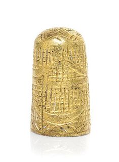A James I Brass Thimble, Height 1 1/8 inches.