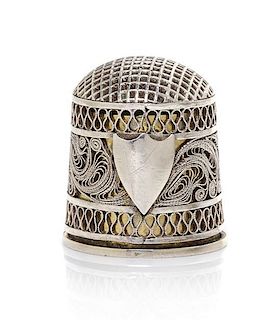 A George III Parcel-Gilt Silver Thimble, Height 3/4 inch.
