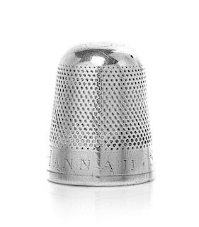 A George III Silver Thimble, Height 7/8 inch.
