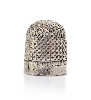 A George III Silver Child's Thimble, Height 1/2 inch.