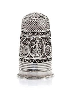 A Regency Silver Filigree Combination Thimble, Height 1 1/8 inches.