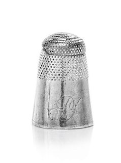 A George III Silver Thimble, Height 1 1/16 inches.