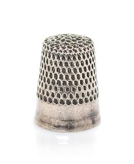 A Silver Miniature Thimble, Height 7/16 inch.