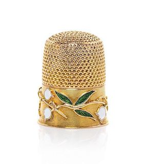 A Gold and Enamel Thimble, Height 3/4 inch.