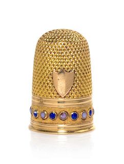 A French Gold and Hardstone-Mounted Thimble, Height 7/8 inch.
