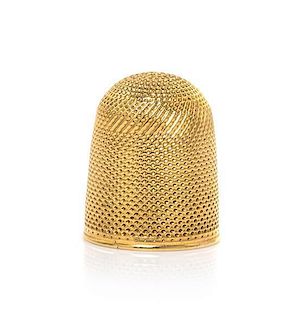 A Louis XVI Gold Thimble, Height 3/4 inch.