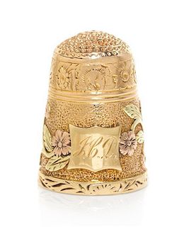 A Continental Three-Color Gold Thimble, Height 1 7/8 inches.