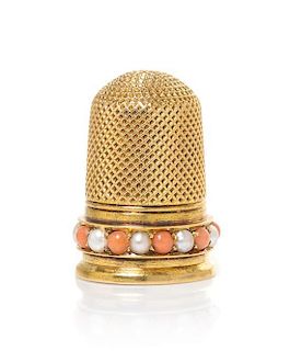 A Continental Gold, Coral and Pearl-Mounted Thimble, Height 7/8 inch.